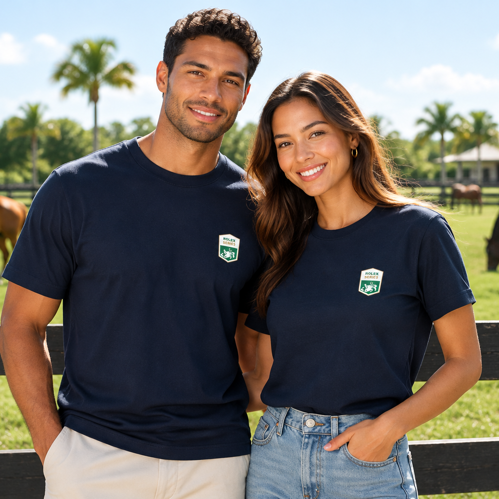 a man and woman wearing a rolex series equestrian t-shirt