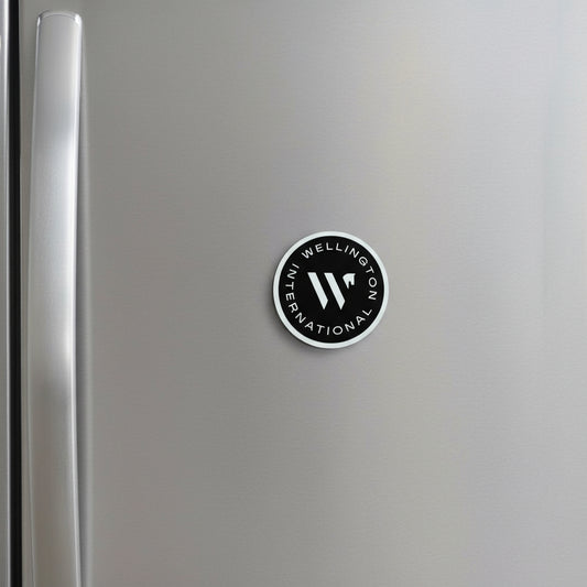 Circular logo with 'Wellington International' text and horse icon on a refridgerator 