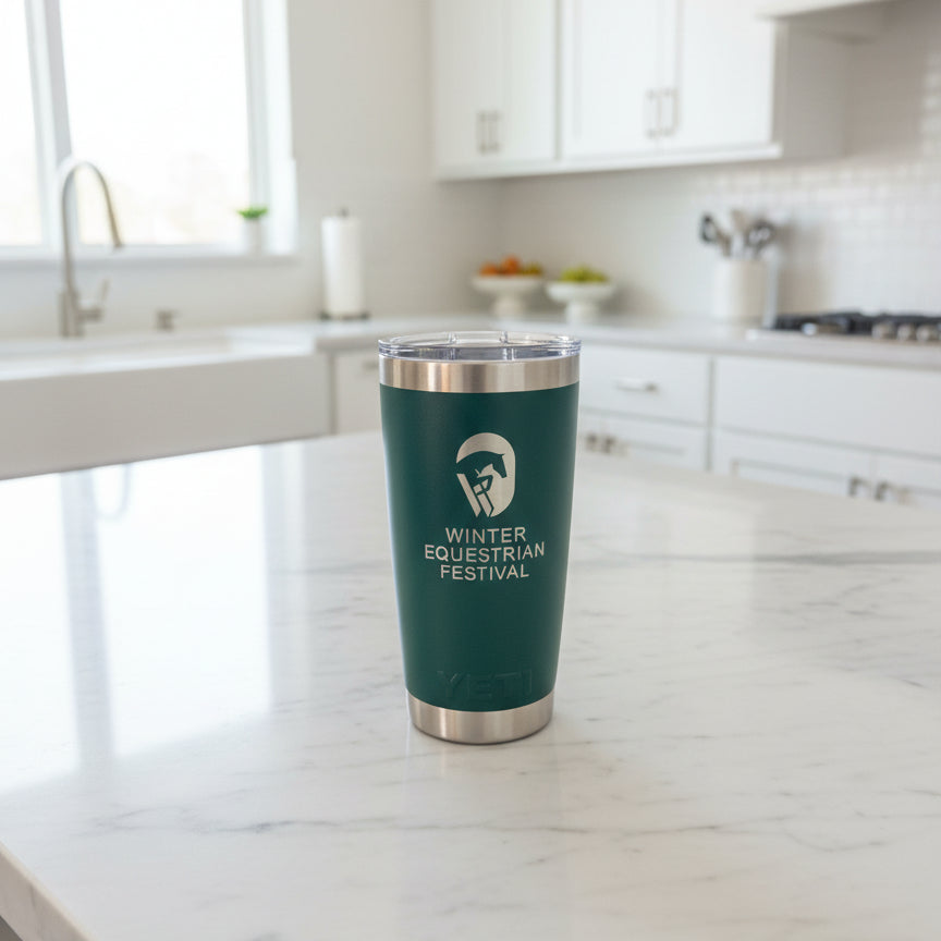 Winter Equestrian Festival YETI Rambler 20 oz green on a kitchen counter