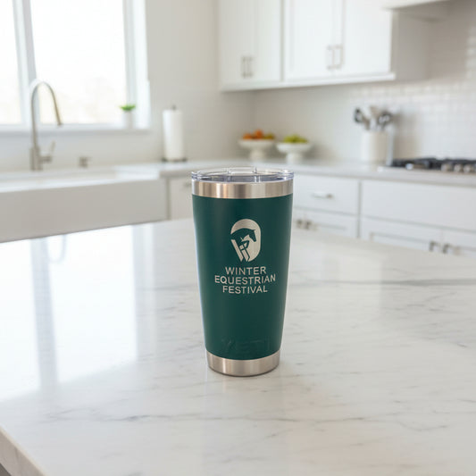Winter Equestrian Festival YETI Rambler 20 oz green on a kitchen counter
